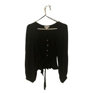 Bell sleeve, runched top with belt.